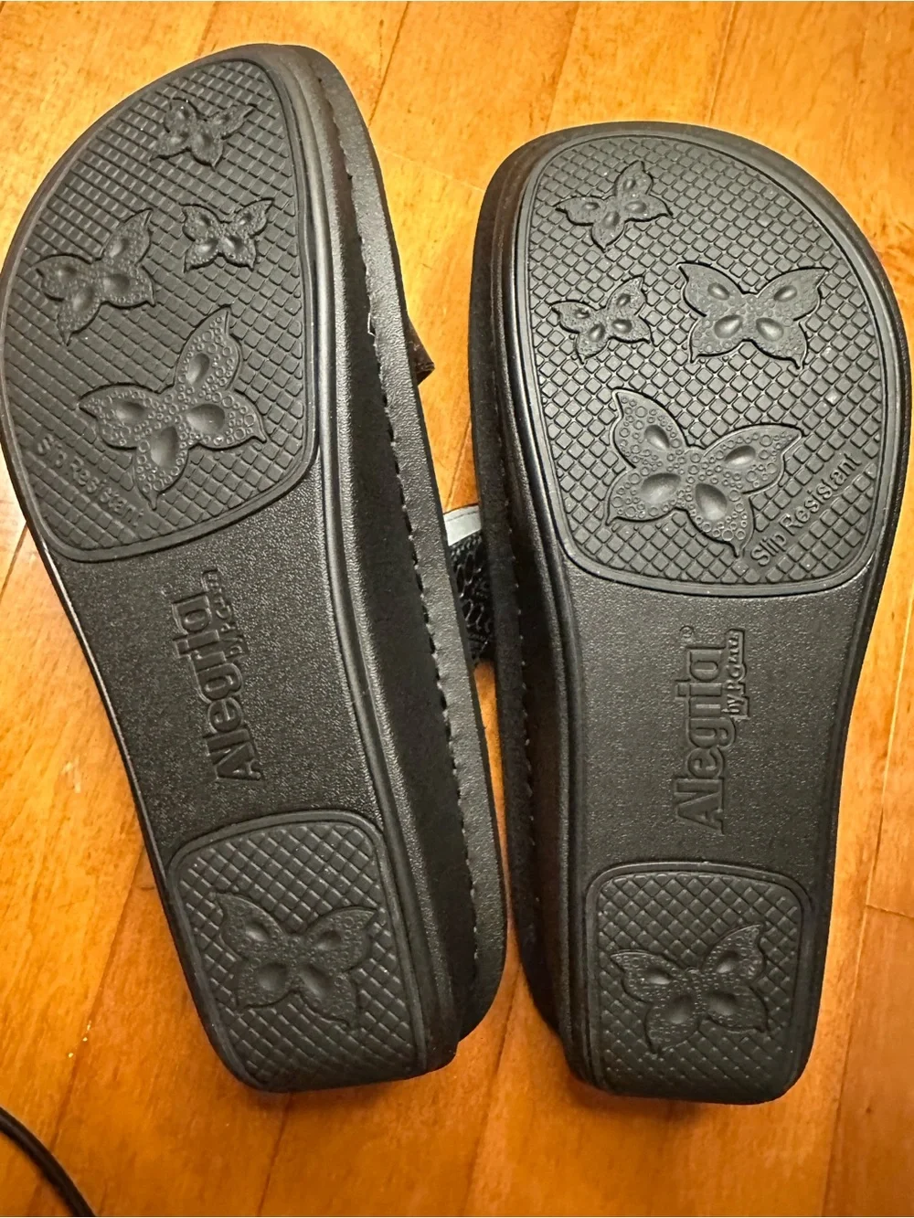 Alegria Black Embossed Leather Slide Sandals with Decorative Medallions